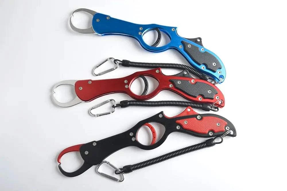 Portable Fish Clip Grip LipSPECIFICATIONSType: Fish GripOrigin: Mainland ChinaMaterial: AluminiumMaterial: AluminiumLength: 28.5CMColor: Red/Blue/BlackBrand Name: TOOLS DXFish GripInterMedia WorldI'M'"WorldPortable Fish Clip Grip Lip